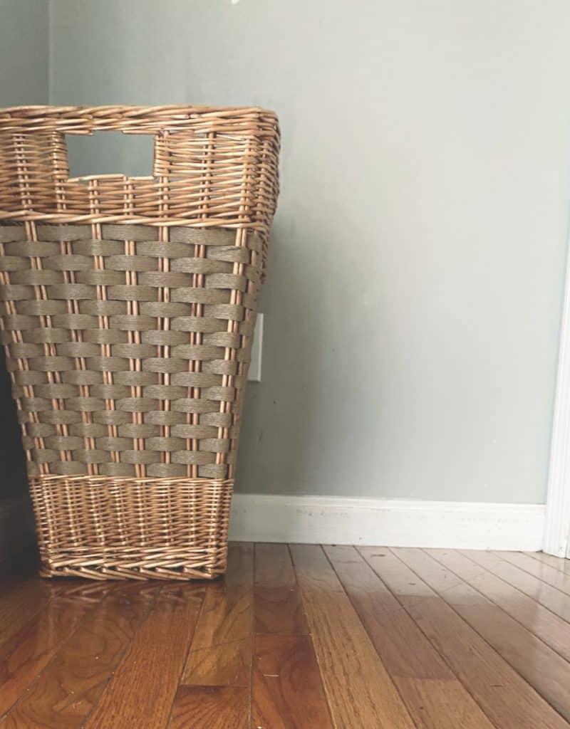 wicker laundry basket in hallway