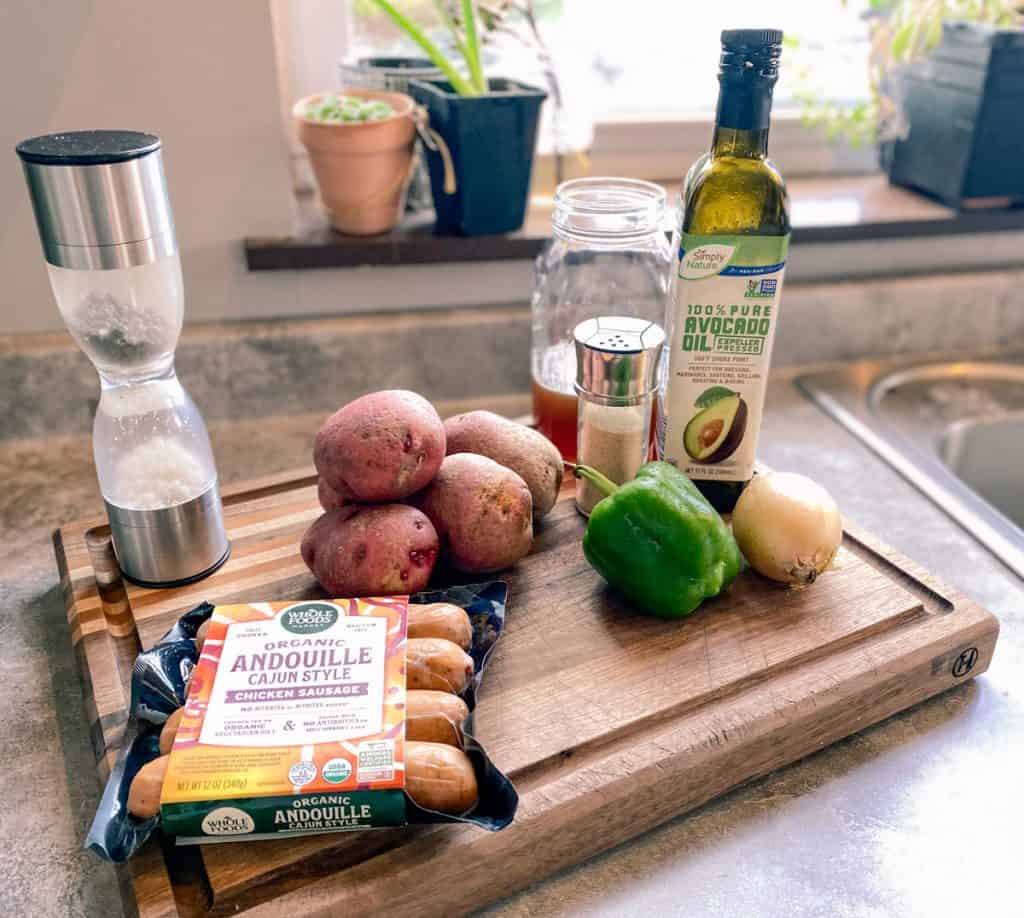 ingredients on counter for smothered potatoes and sausage recipe