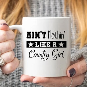 ain't nothin' like a country girl black and white coffee mug