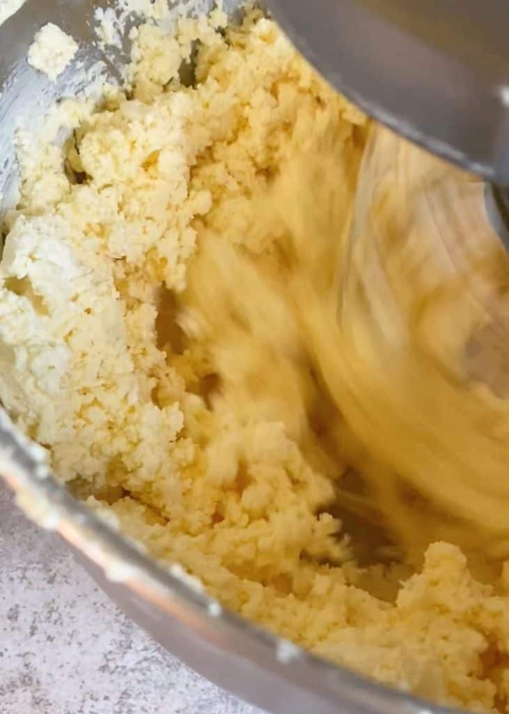 butter being made in a stand mixer