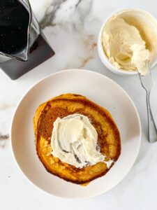 sourdough pumpkin pancakes topped with spreadable cinnamon butter